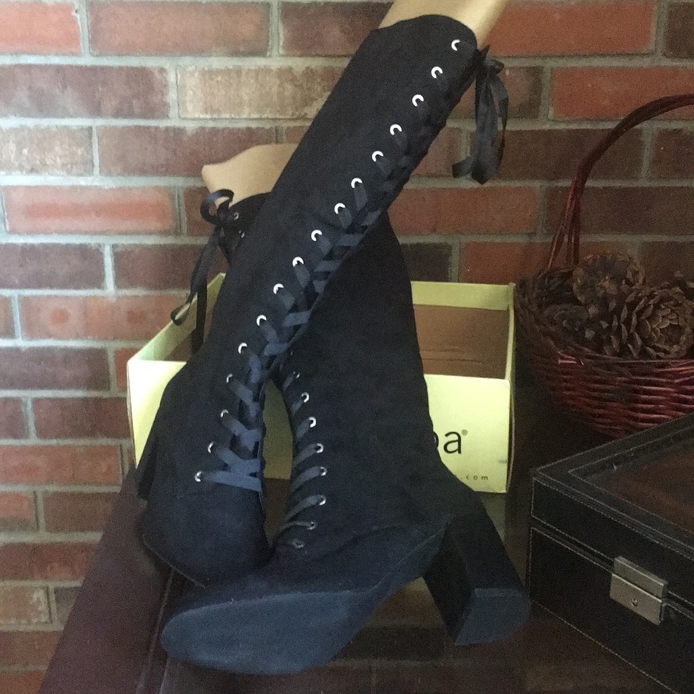 Lace Up boots.  Brand new in box.
